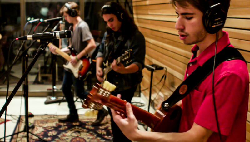 School of Rock students recording a cover of Queen's